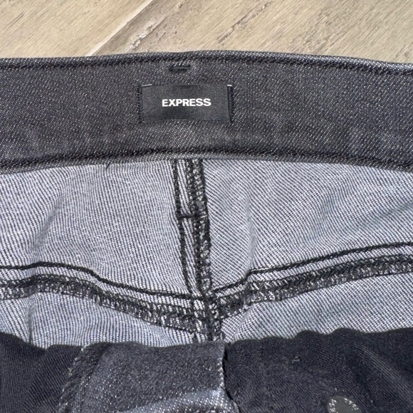 EXPRESS | Super High Waisted Faux Leather Paneled '90s Slim Jeans - Picture 6 of 9